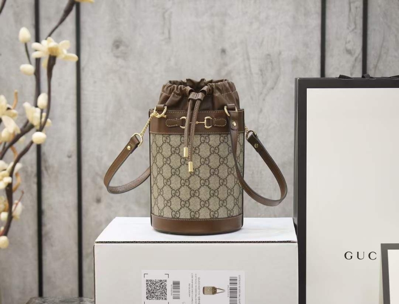 G*u*i bucket bags